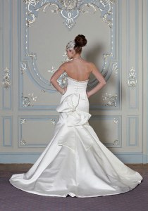 Sumptuous duchesse satin fishtail with large bow detail on rear