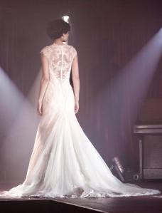 Gorgeous sheer low back adds drama with a full train - breathtaking!